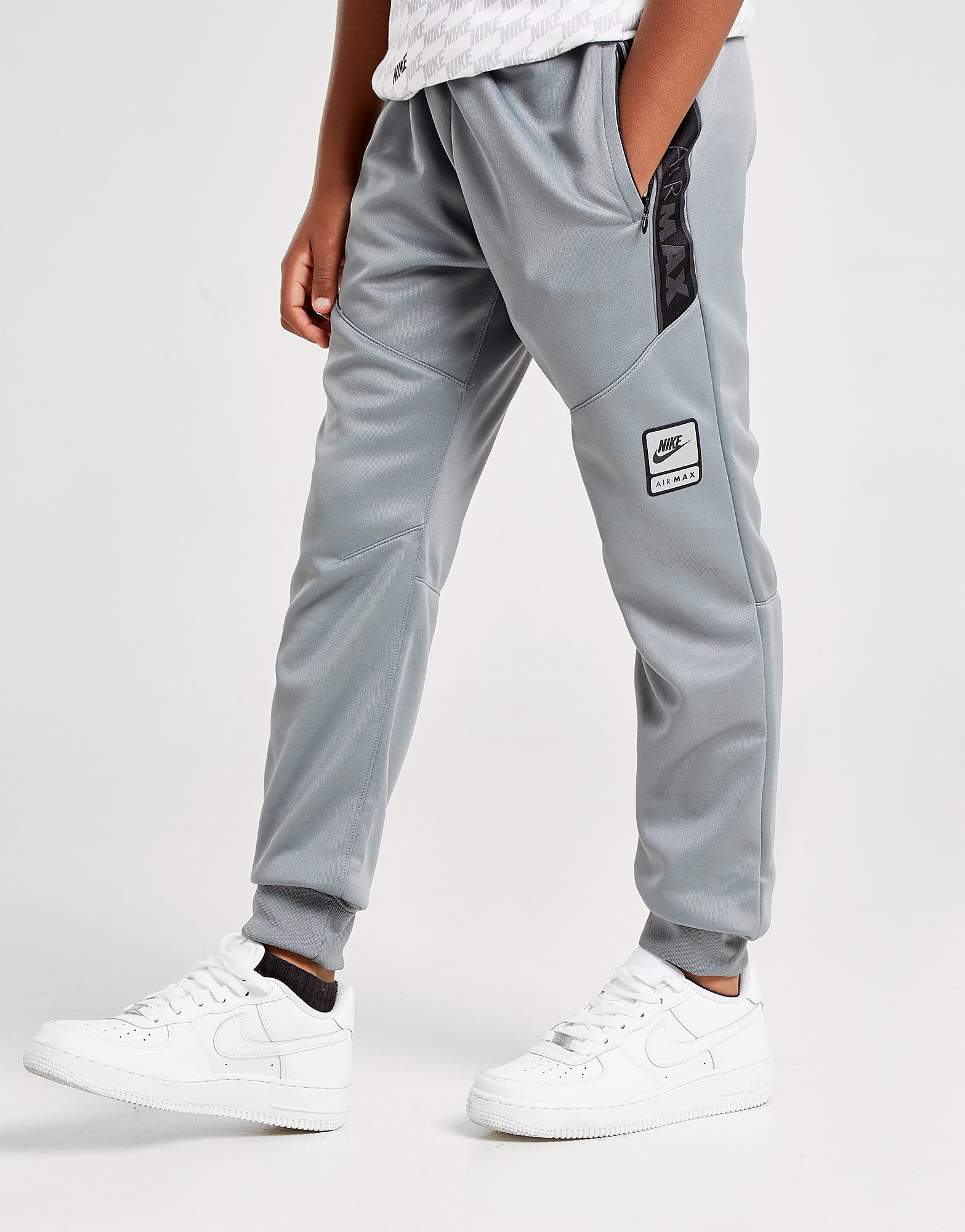 nike tape poly track pants junior