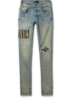 AMIRI - Skinny-Fit Leather-Trimmed Distressed Jeans - Men - Blue - 28