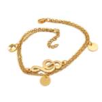 BUNGSA Armband Bettelarmband Notenschlüssel gold aus Edelstahl Damen (1 Armband, 1-tlg), Bracelet Armschmuck